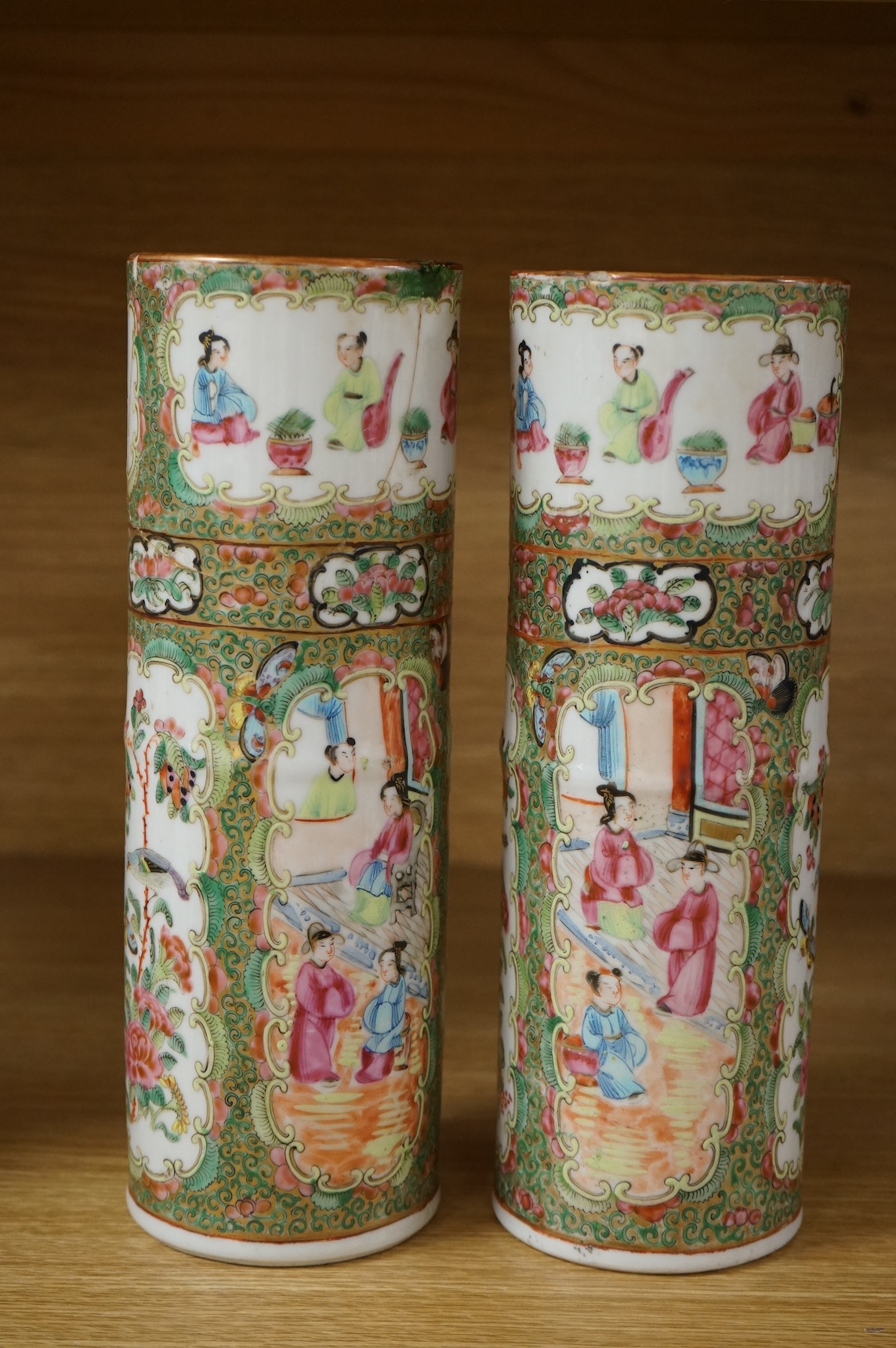 A pair of 18th century Chinese famille rose sleeve vases, a pair of 19th century Canton pattern vases and two English spill vases (6), tallest 25cm